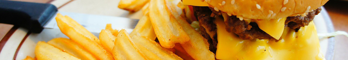 Eating American (Traditional) Burger at Time Drive In restaurant in Seneca, SC.